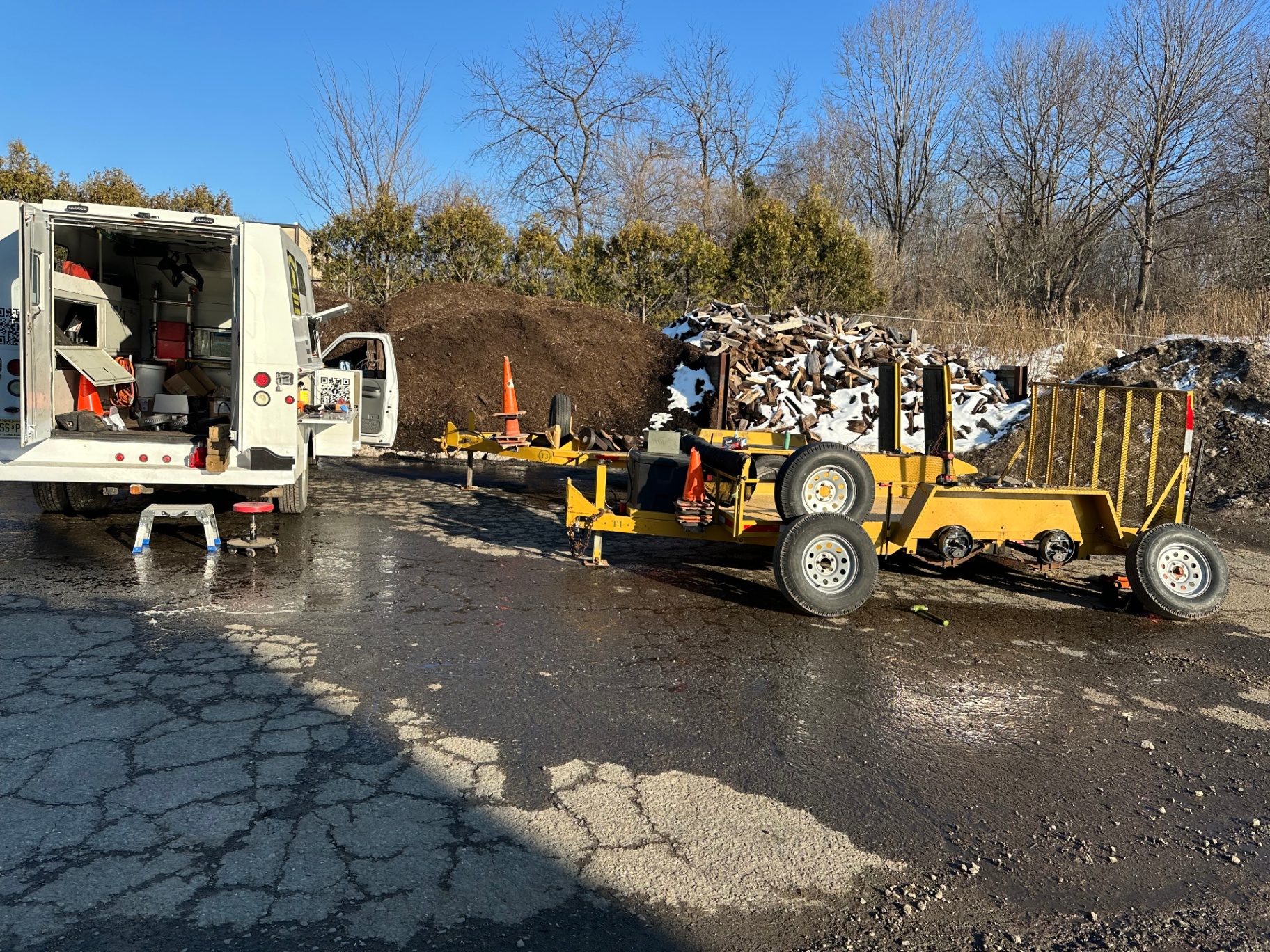 Keep Them Rolling mobile service truck next to a trailer on a job site in Morris County NJ