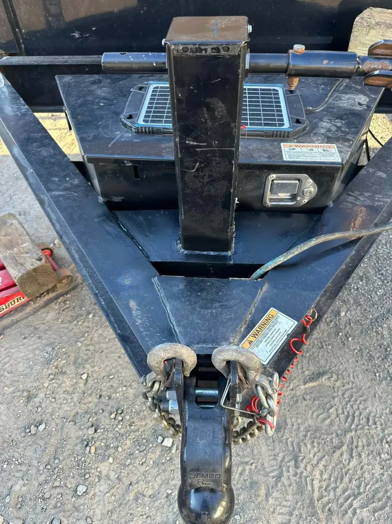 Trailer tongue with coupler, safety chains and battery box ready for service